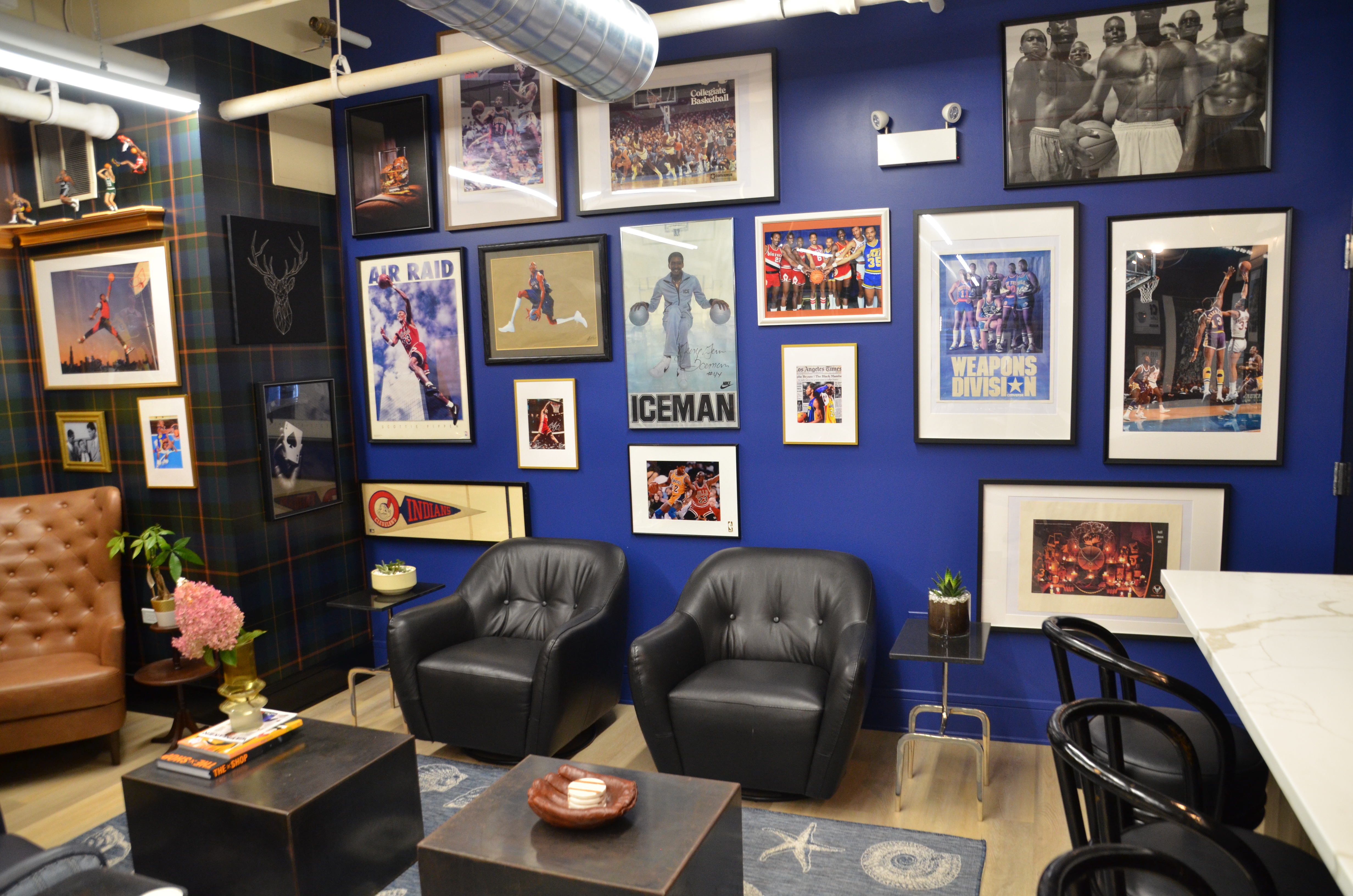 Lounge interior with sports memorabilia and comfortable seating